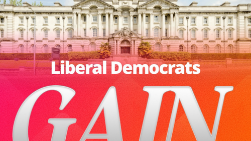Lib Dems gain control of Stockport - photo of the town hall with text over.