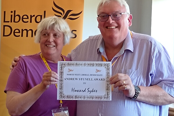 Howard Sykes receives award from regional president Jackie Pearcey