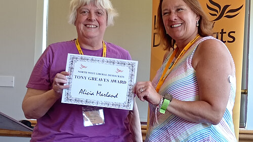 Alicia Marland receives her award